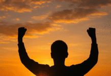 Why Self-Belief Matters in Daily Life A confident person standing tall in sunlight with self-belief