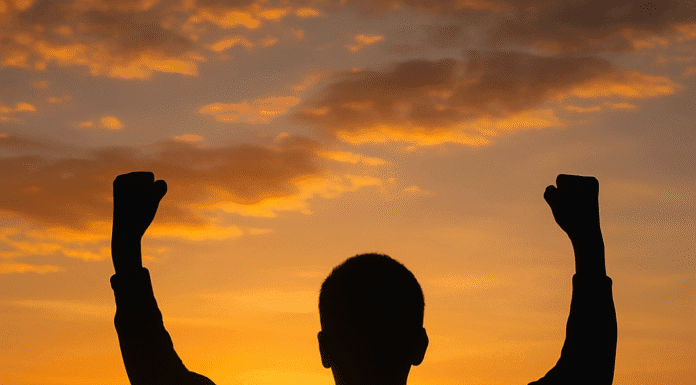 Why Self-Belief Matters in Daily Life A confident person standing tall in sunlight with self-belief