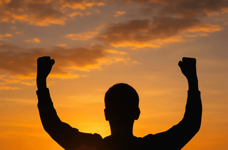 Why Self-Belief Matters in Daily Life A confident person standing tall in sunlight with self-belief